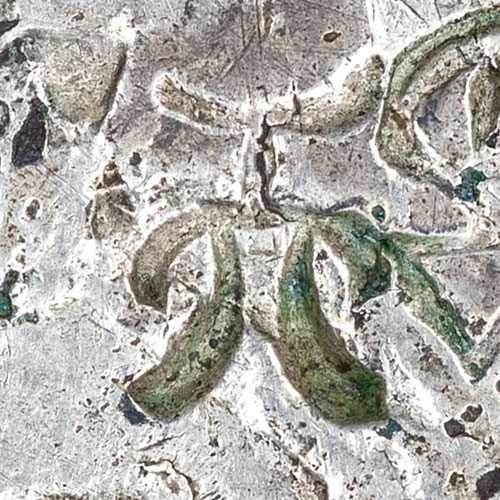 Seal script version of 天 - tiān - heaven, sky, day
