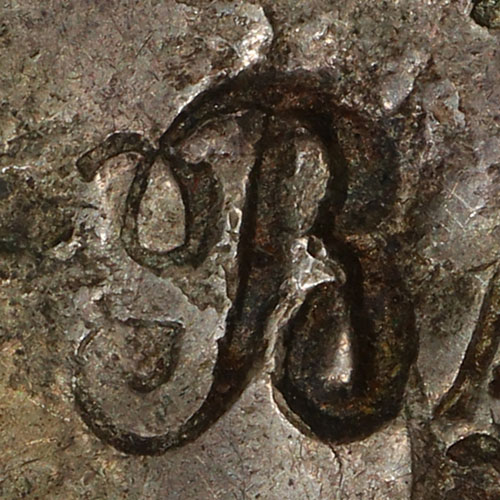 Part of a monogram, like a Kings halmark?
