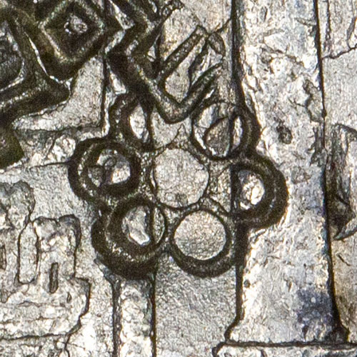 Circular flower shaped symbol chopmark