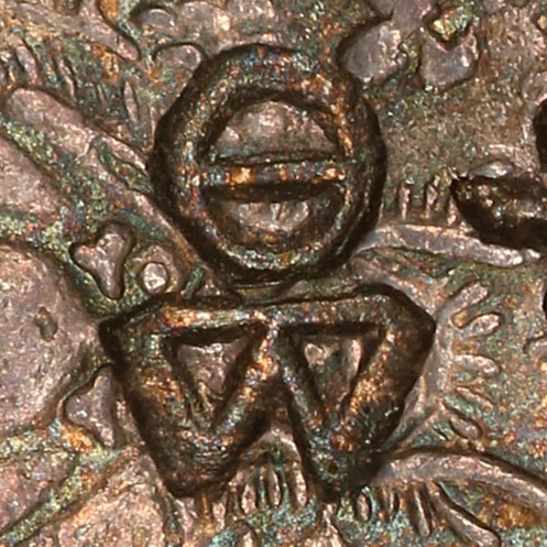 Possible stylized version of 显 - (simplified form of 顯) xiǎn - prominent, conspicuous, apparent, manifest